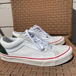 White and Green Sneakers with Red Accents